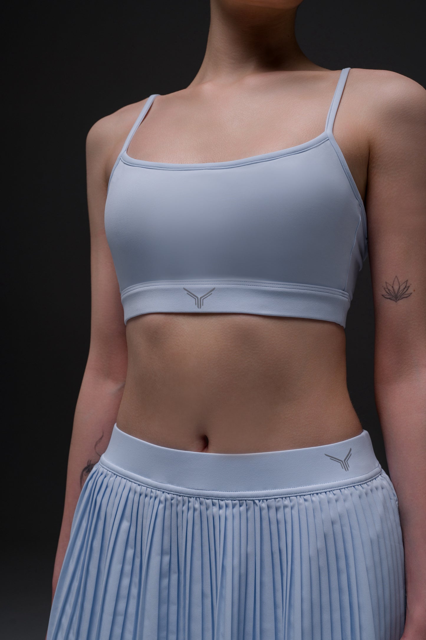 padded sports bra with reflective logo